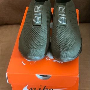 Green flynit sneakers